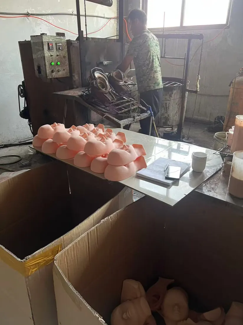 Silicone mannequin head shells on the casting bench
